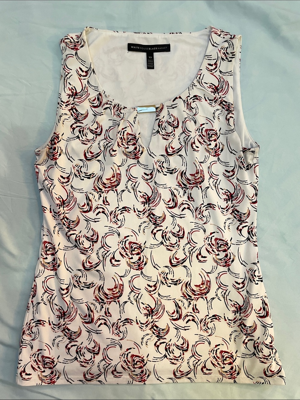 White House Black Market Cream Sleeveless Tank with Red & Black Swirl Print